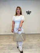 Bolso de piel beige con asa de carey