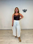 Pantalón efecto lino asimétrico beige con cintura elástica