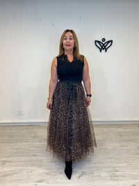 Falda midi de tul estampado animal print con lazo negro