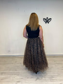 Falda midi de tul estampado animal print con lazo negro