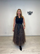 Falda midi de tul estampado animal print con lazo negro
