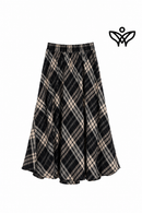 Falda midi de cuadros negros y beige de lana con bolsillos