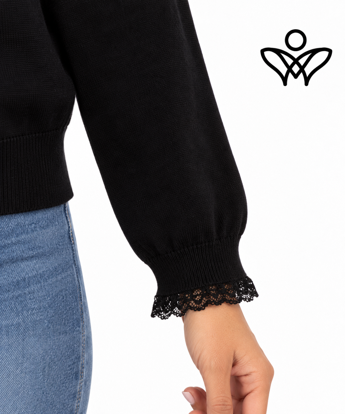 Jersey negro de punto suave con puntilla en cuello y puños