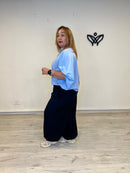 Camisa oversize azul claro con cuello camisero