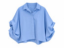 Camisa oversize azul claro con cuello camisero