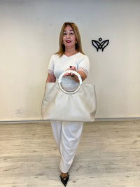 Bolso de piel beige con asa de carey