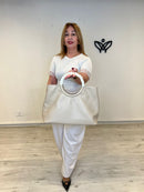 Bolso de piel beige con asa de carey