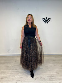 Falda midi de tul estampado animal print con lazo negro